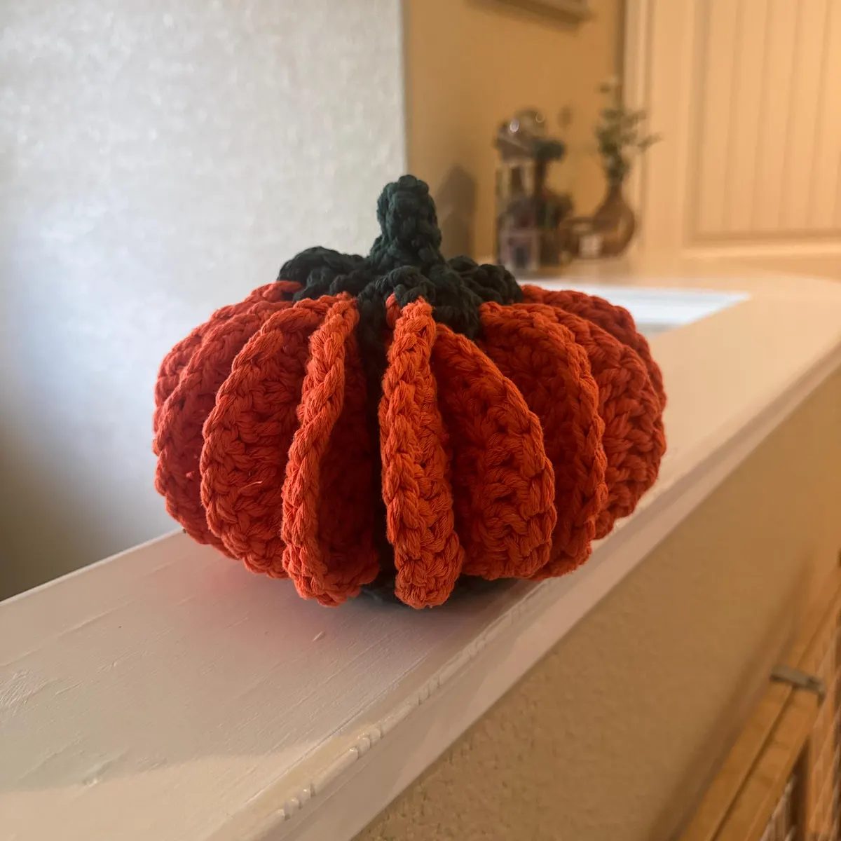 Finished pumpkin made by a customer on a shelf